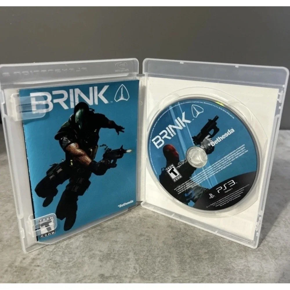 Lot of 4 Sony PS3 Games Brink Mass Effect‎ 2 Uncharted 3 Socom 4 CIB